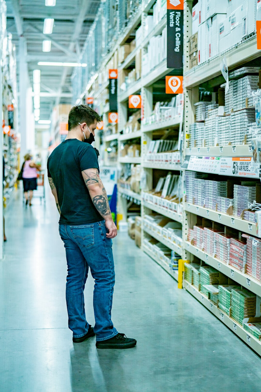 store detective catching thief in supermarket